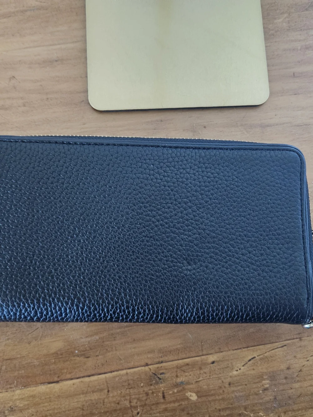 kate spade black pebbled leather wristlet clutch with gold logo